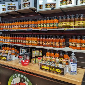 Pepper Palace - shelves of pepper sauces and hot sauces - Herbs & Spices Near Me - Sarasota, Florida