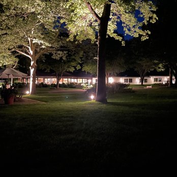 Lake Shore Resort - The resort lit up at night, taken while sitting around a campfire they light just before sundown. Bring bug spray! - Resorts Near Me - Saugatuck, Michigan