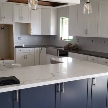 Alltec Construction Services - White Shaker Cabinets & Concrete Grey Quartz  With  Naval Blue Shaker Cabinets & Calacatta Luna Quartz - Flooring Near Me - Rancho Cucamonga, California