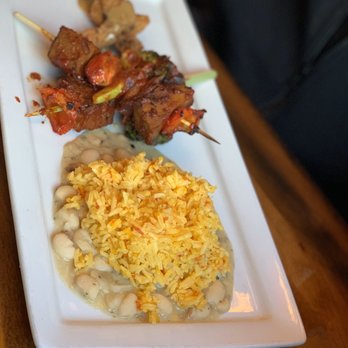 Veganized - Bbq skewers with saffron rice and white beans and mushrooms (far left) - Vegan Near Me - New Brunswick, New Jersey Veganized - Bbq skewers with saffron rice and white beans and mushrooms (far left) - Vegan Near Me - New Brunswick, New Jersey
