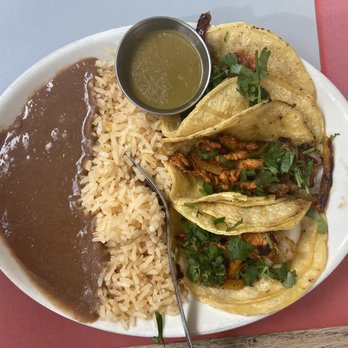 Danny's Tacos & Grill - Chicken tacos with the green hot sauce and el pastor (I think) on the other plate. - Mexican Near Me - Arlington, Texas Danny's Tacos & Grill - Chicken tacos with the green hot sauce and el pastor (I think) on the other plate. - Mexican Near Me - Arlington, Texas
