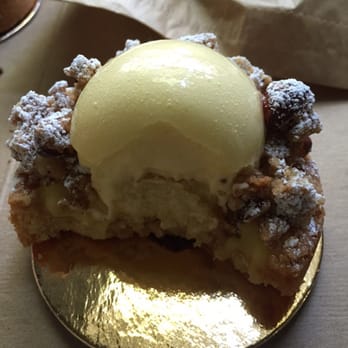 Fournée Bakery - Texture inside the lemon praline tart, cream ball mounted on pralines mounted on lemon curd. Yums! - Bakeries Near Me - Berkeley, California