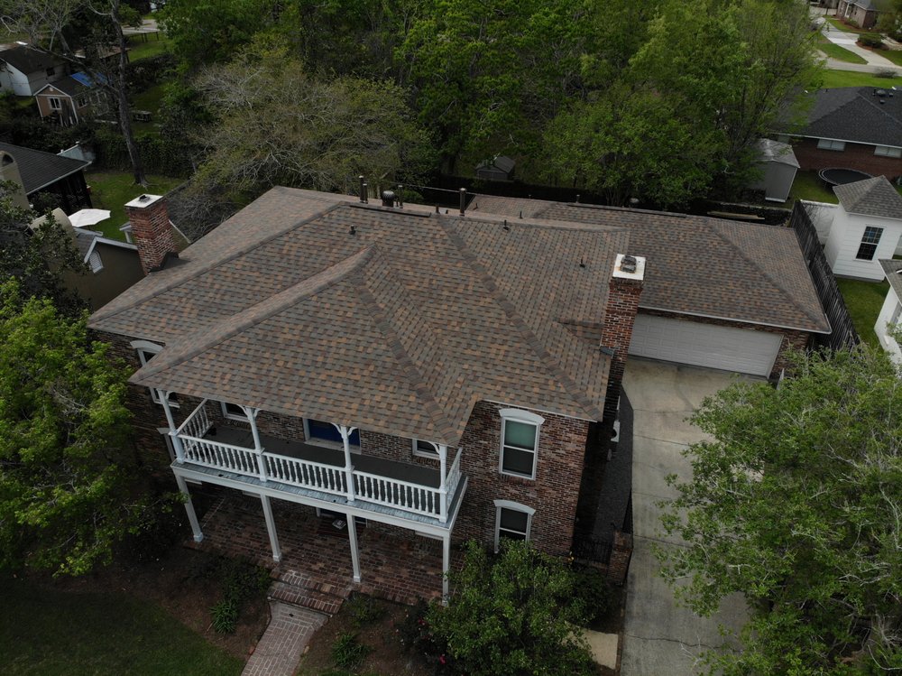 Slide of Mid City Roofing