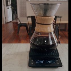 Bread & Butter Coffee - A photo of us doing a pour over of our featured roasts of the week