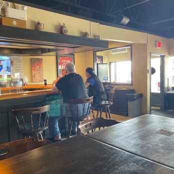 The Little Tavern Pizza Project - two men sitting at the bar - Pizza Near Me - Calgary, Alberta The Little Tavern Pizza Project - two men sitting at the bar - Pizza Near Me - Calgary, Alberta