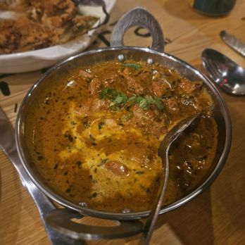 Pangat - Smoky Butter Chicken- Tandoori chicken in silky tomato gravy. $19. Pricey as rice isn't included but excellent - Indian Near Me - Brooklyn, New York