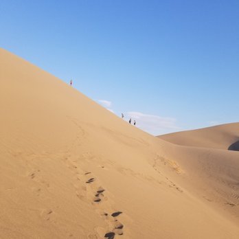 Bruneau Dunes State Park - Walking up the backside of the dune, but photo is from the lower ravine. - Parks Near Me - Mountain Home, Idaho Bruneau Dunes State Park - Walking up the backside of the dune, but photo is from the lower ravine. - Parks Near Me - Mountain Home, Idaho