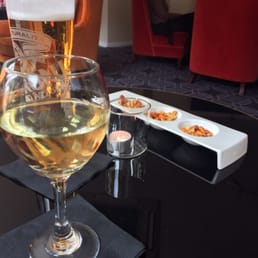 Our drinks with lovely bar snacks.