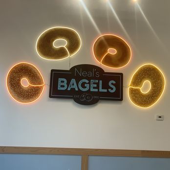 Neal's Bagels - a neon sign with doughnuts - Bagels Near Me - Gaithersburg, Maryland