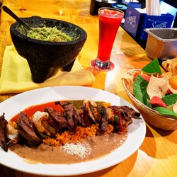 La Diferencia - Traditional Steak and Shrimp Alambre with Guacamole. Come dine with us, you will enjoy it. Be one of us. Be different.