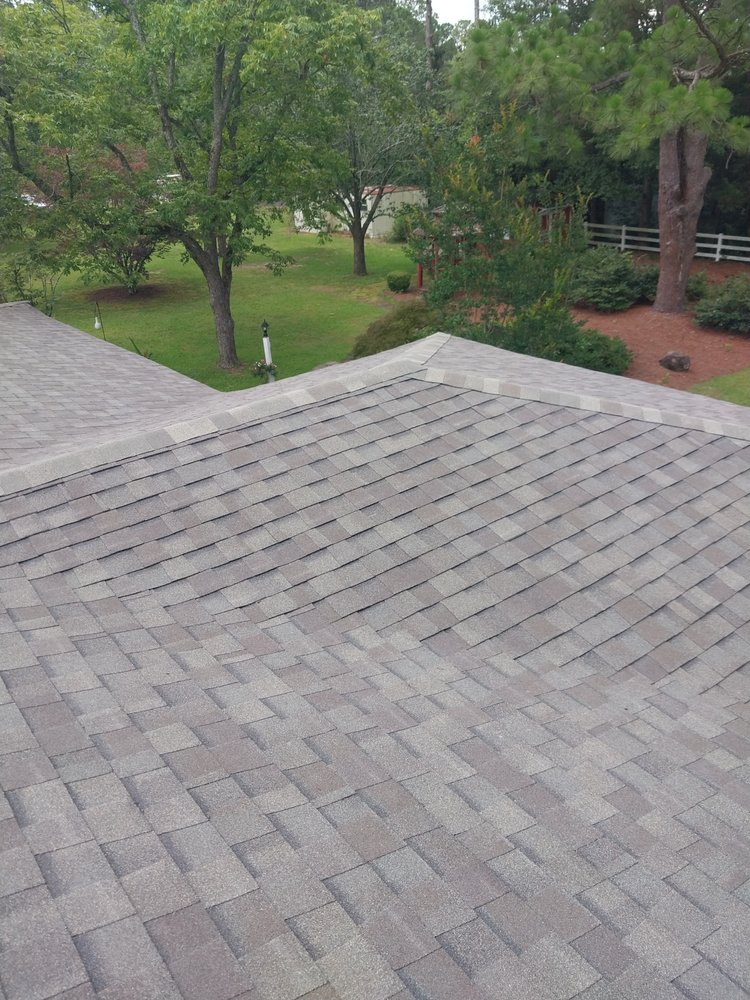 Slide of Tyndal Roofing