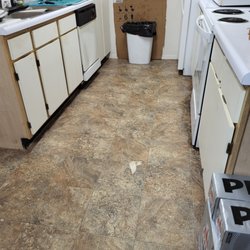 JCL Hardwood Floors - I need plank vinyl laid in kitchen, master bath & entry. 252 sq ft total. I have materials.
