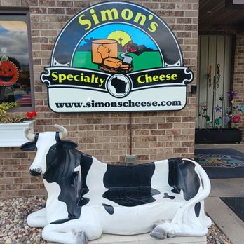 Simon's Specialty Cheese - a statue of a cow - Cheese Shops Near Me - Appleton, Wisconsin Simon's Specialty Cheese - a statue of a cow - Cheese Shops Near Me - Appleton, Wisconsin