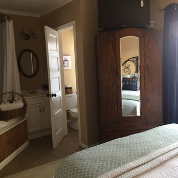 44 Spanish Street Inn - Lantana room - nice armoire to hold clothes has an iron and extra pillows inside - Bed & Breakfast Near Me - Saint Augustine, Florida 44 Spanish Street Inn - Lantana room - nice armoire to hold clothes has an iron and extra pillows inside - Bed & Breakfast Near Me - Saint Augustine, Florida
