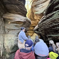 Lost Canyon Tours - Going through a very narrow opening in the canyon.
