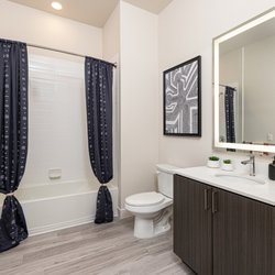 La Via Luxury Apartments - Spacious well-lit bathrooms