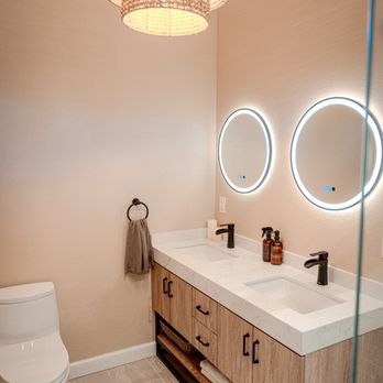 D & L Builders - a bathroom with two sinks and a toilet - General Contractors Near Me - San Diego, California