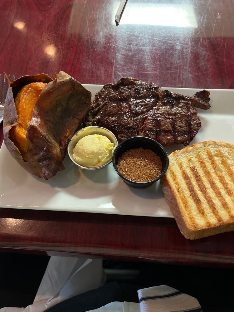 Ribeyes Steakhouse Logo