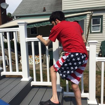 Hope Custom Builders - My son Ben climbing up the new deck made by Hope Custom Builders - General Contractors Near Me - West Babylon, New York Hope Custom Builders - My son Ben climbing up the new deck made by Hope Custom Builders - General Contractors Near Me - West Babylon, New York