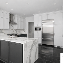 Renu Kitchen - Custom cabinet refacing with modern finishes and updated style.