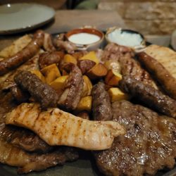 Mamadi‘s Grill - Mixed Grilled Plate Chicken, steak, sausage, and more!