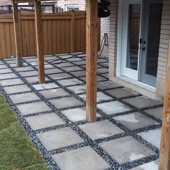 Valley Contracting & Renovations - a patio with a pergolated patio - General Contractors Near Me