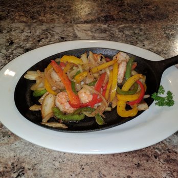 Gabby's Cuisine - Our sizzling fajitas choice of chicken, beef, shrimp or mix are a killer. - Mexican Near Me - Murphys, California Gabby's Cuisine - Our sizzling fajitas choice of chicken, beef, shrimp or mix are a killer. - Mexican Near Me - Murphys, California