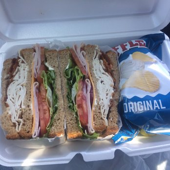 Cafe Bagel - Club sandwich with chips and pickle on the side - Bagels Near Me - Elkridge, Maryland Cafe Bagel - Club sandwich with chips and pickle on the side - Bagels Near Me - Elkridge, Maryland