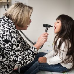 University Health Collier Health Center - A pediatric nurse examines a young child