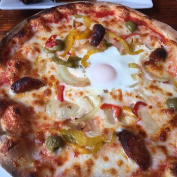 La Pétaudière - Specialty pizza.  The only one with an egg. - French Near Me - Paris, 75