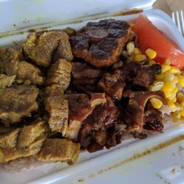 Patty Time: Large Curry Goat with Oxtail and Rice and Peas.