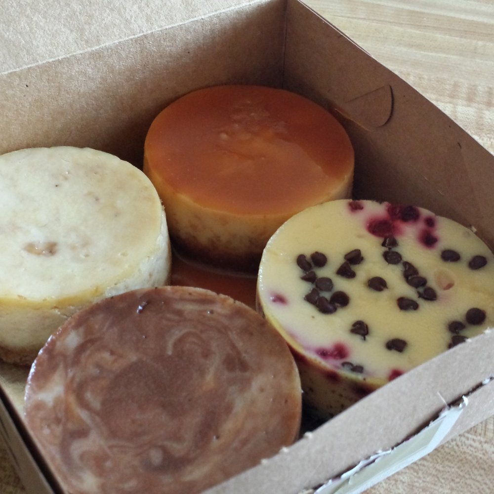 Reuschelle's Cheesecakes - 4 x 3" sampler starting at the top; Caramel Apple, White Chocolate Raspberry Chocolate Chip, Chocolate Marble, and Banana Rum - Desserts Near Me - Hayward, California