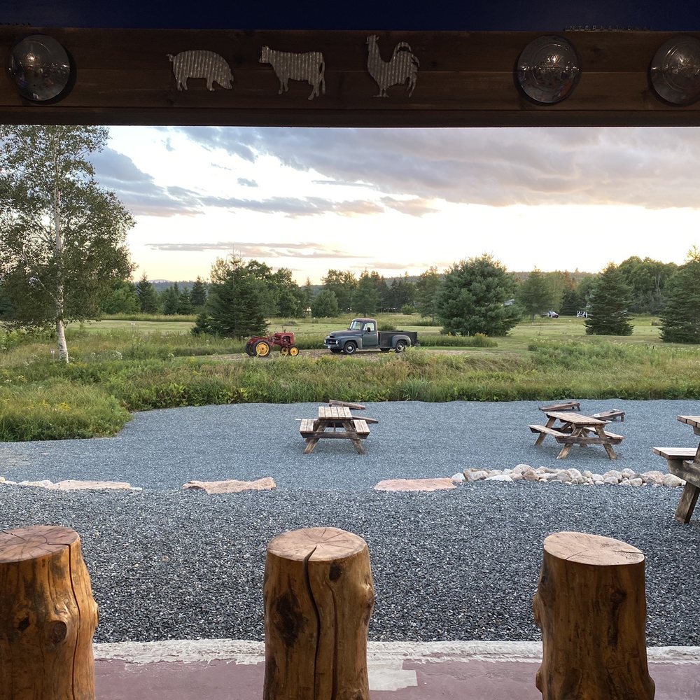 Flanders Bay BBQ - The view towards to cottage area and Flanders Bay from inside the restaurant.  It's a very, very peaceful and rural setting. - Barbeque Near Me - Sullivan, Maine
