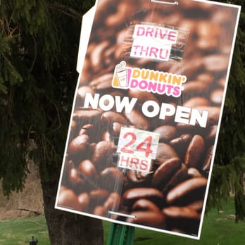 Dunkin' -  a donut shop sign on a pole - Donuts Near Me - Hope, New Jersey