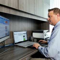 Clinton Sheets, MD - Dr. Clinton Sheets at his desk