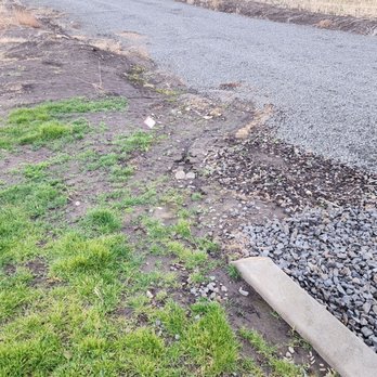 Acey's Landscape Services - Improper drainage eroding lawn, driveway and curbing - Landscaping Near Me - Clarkston, Washington
