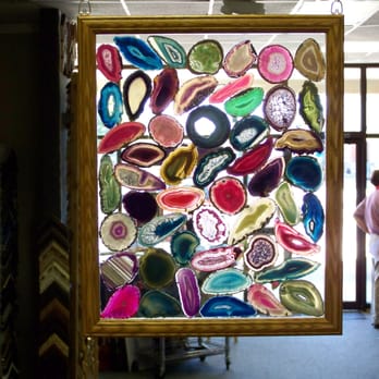 Frame Works - Sliced Agate collection arranged between two pieces of glass and framed.  Designed to hang in a window as a sun catcher. - Framing Near Me - Canton, Michigan