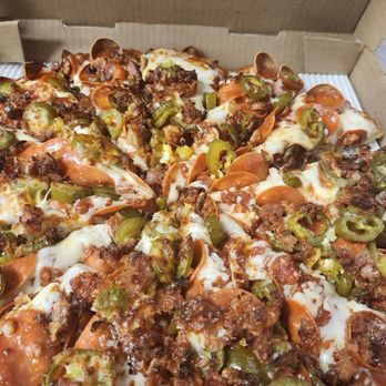 Mountain Mike's Pizza - Pepperoni, bacon, jalapeño custom pizza - Chicken Wings Near Me - Tucson, Arizona