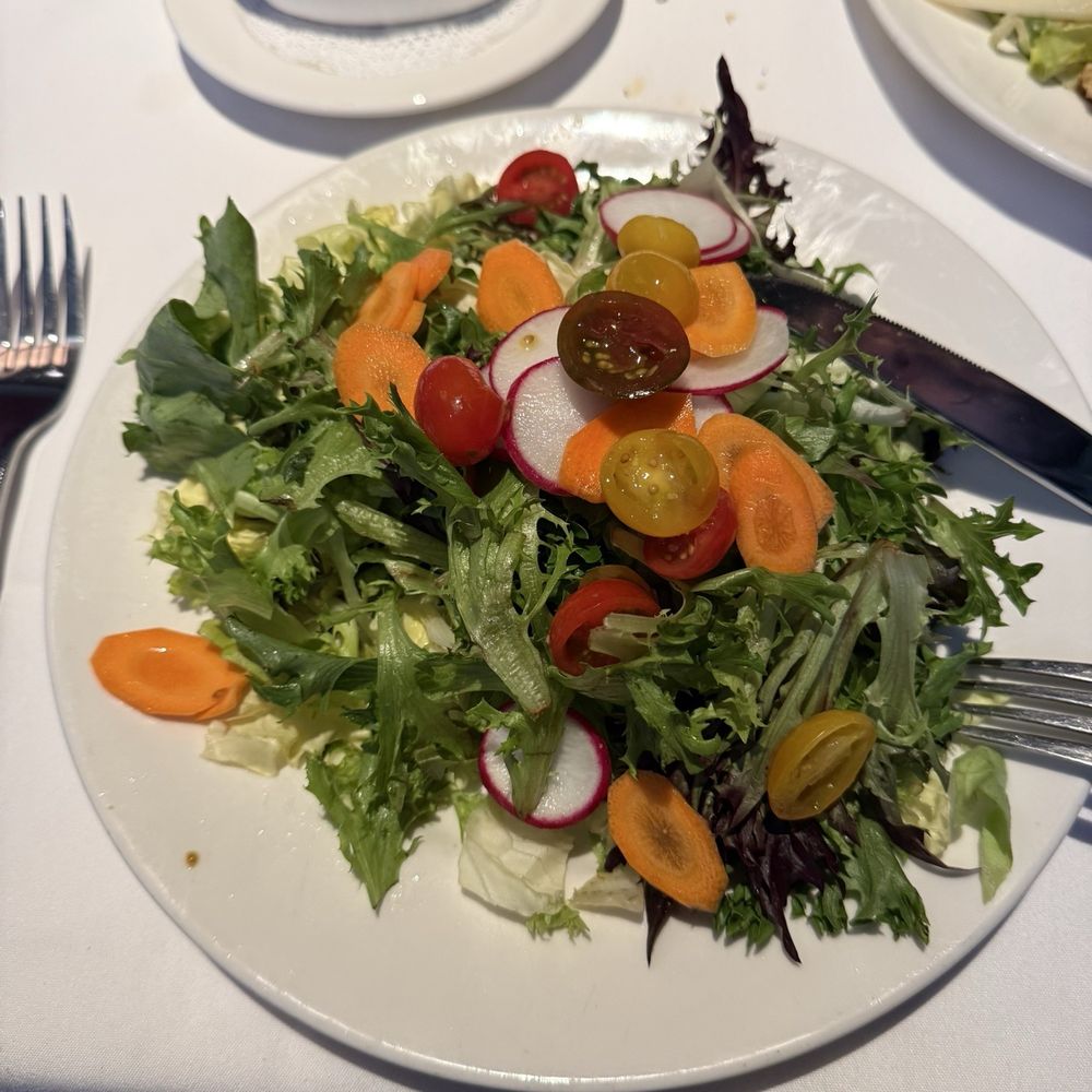 The Capital Grille - Field Greens, Butter Leaf Lettuce, Heirloom Tomatoes with Parmesan Vinaigrette - Steakhouses Near Me - Louisville, Kentucky The Capital Grille - Field Greens, Butter Leaf Lettuce, Heirloom Tomatoes with Parmesan Vinaigrette - Steakhouses Near Me - Louisville, Kentucky