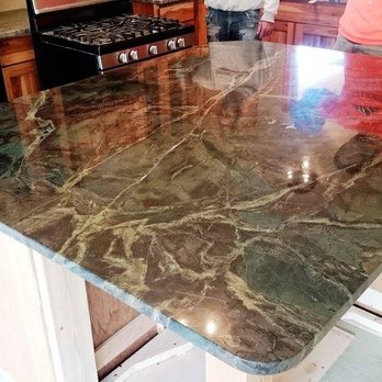 Craft Right Design & Build - Caleb guided us through the process of choosing this amazing stone for our kitchen island, then fabricated and installed it with care - General Contractors Near Me Craft Right Design & Build - Caleb guided us through the process of choosing this amazing stone for our kitchen island, then fabricated and installed it with care - General Contractors Near Me
