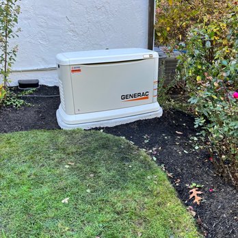 Upstate Power Systems - 26kw Generac generator set on a GenPad concrete base. - Electricians Near Me - Ionia, New York Upstate Power Systems - 26kw Generac generator set on a GenPad concrete base. - Electricians Near Me - Ionia, New York