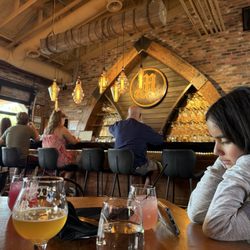 Monkless Belgian Ales - The bar and a hungry kiddo.