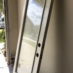 Temporary door that they took off to rehang my old door once they fixed it & moved it into my garage.
