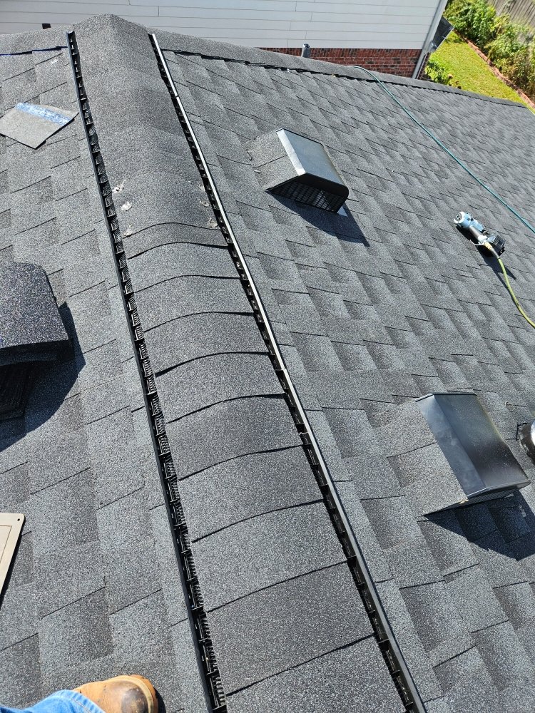 Slide of Daniel's Roofing and Painting