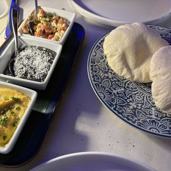 Meraki - Classic hummus (the olive oil drizzle, wow), black garlic hummus, feta pimento cheese (turned my boyfriend into a pimento cheese lover) - Mediterranean Near Me - Fort Worth, Texas