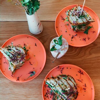 Outpost Kitchen - Chicken pesto sandwiches and happy dayz smoothie - Breakfast & Brunch Near Me - Costa Mesa, California Outpost Kitchen - Chicken pesto sandwiches and happy dayz smoothie - Breakfast & Brunch Near Me - Costa Mesa, California