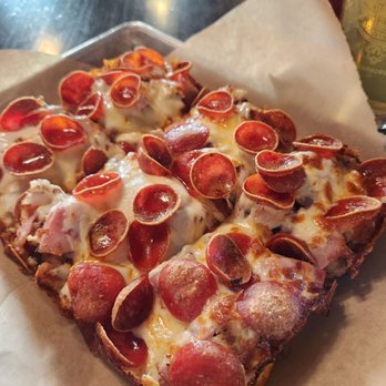 The Workshop Food Hall and Bar - Meat Raffle Pizza - Bars Near Me - Rochester, Minnesota