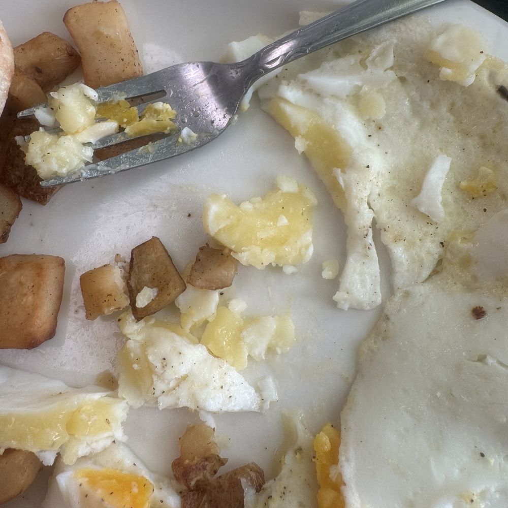 "Over medium eggs" but whites weren't cooked all the way through. "Over medium eggs" but whites weren't cooked all the way through.