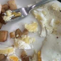 "Over medium eggs" but whites weren't cooked all the way through. "Over medium eggs" but whites weren't cooked all the way through.