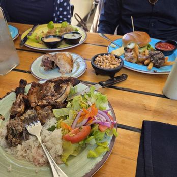 El Mono - Unfortunately all this food was wasted. Rotisserie chicken, Angus burger and salad. - Peruvian Near Me - Berkeley, California